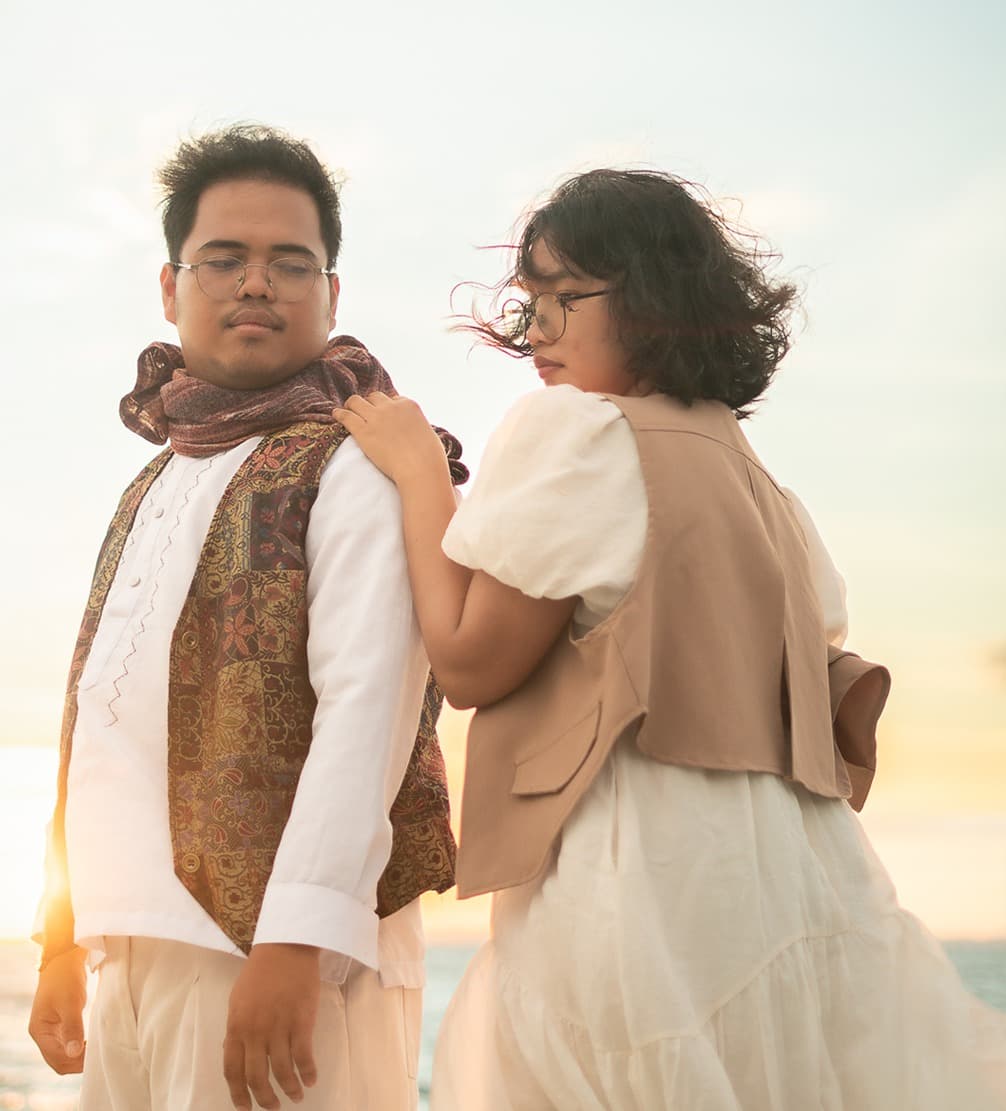 The Morph, a musical duo from Socorro Island, standing together at sunset